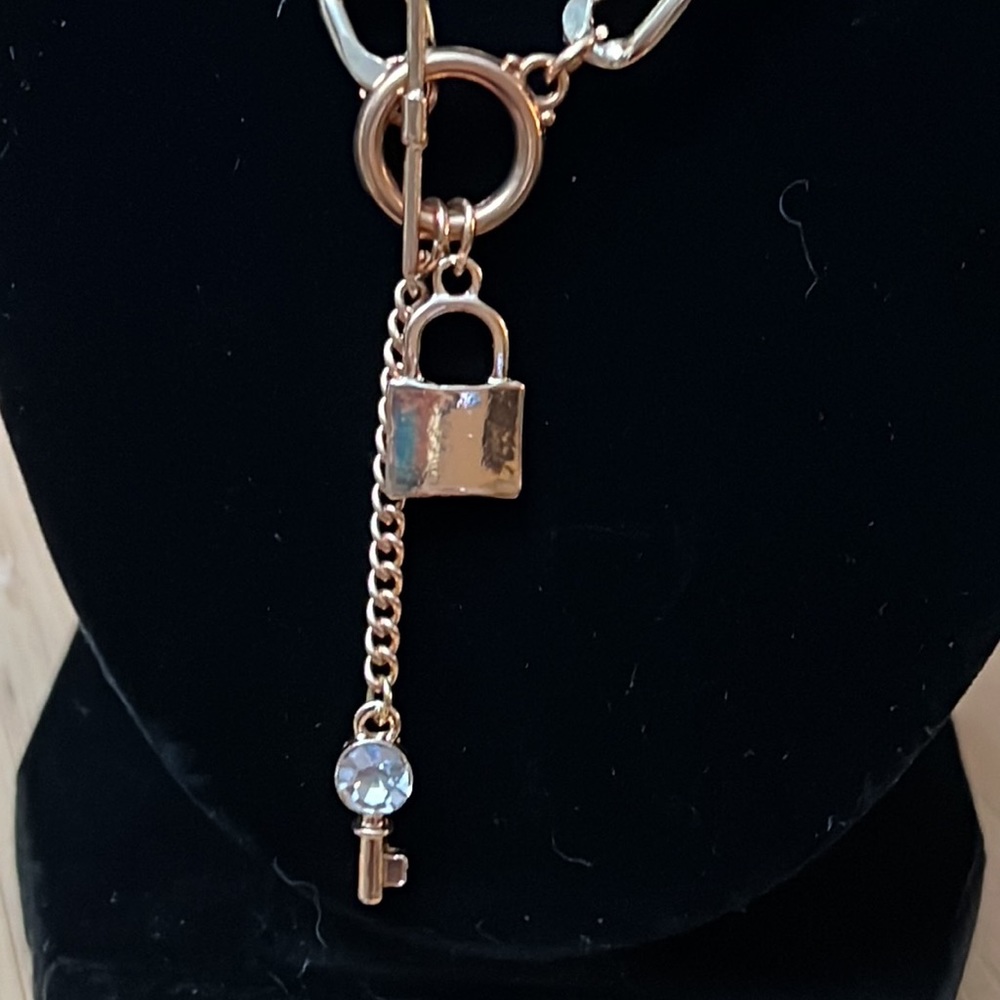 Gold tone lock and key necklace